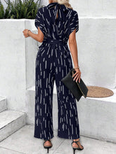 Load image into Gallery viewer, Tied Printed Mock Neck Wide Leg Jumpsuit