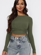 Load image into Gallery viewer, Drawstring Round Neck Long Sleeve Cropped Top