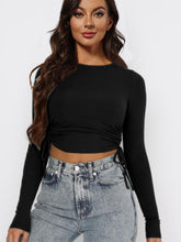 Load image into Gallery viewer, Drawstring Round Neck Long Sleeve Cropped Top