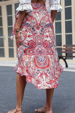 Load image into Gallery viewer, Printed Asymmetrical Wrap Skirt