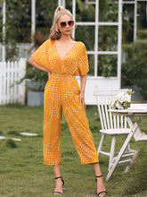 Load image into Gallery viewer, Polka Dot Surplice Neck Jumpsuit with Pockets